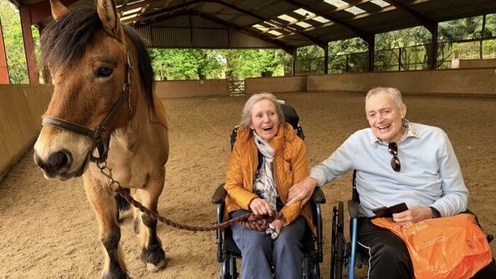 A resident at a care home in Fleet has been reunited with her lifelong passion for horses, thanks to a touching wish from her husband.
